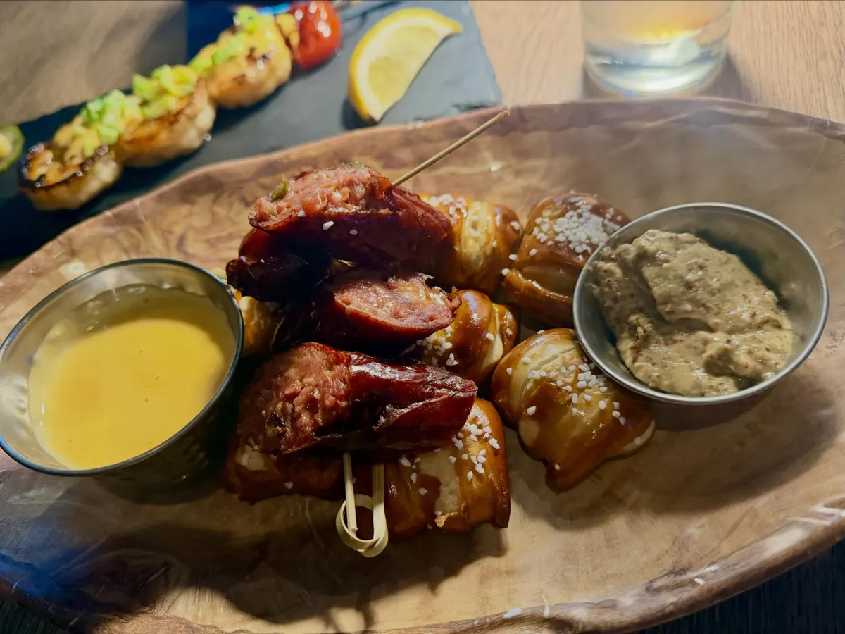 Sausage and pretzels with beer cheese at Copper Shaker